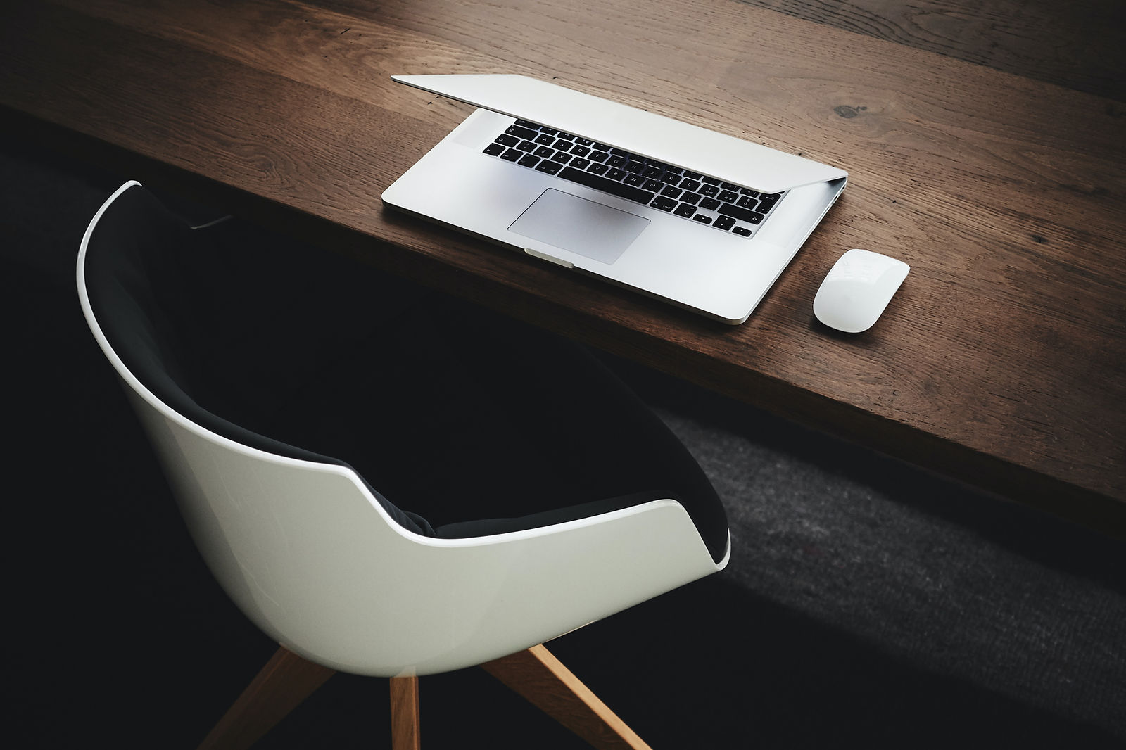 Table with laptop and chair